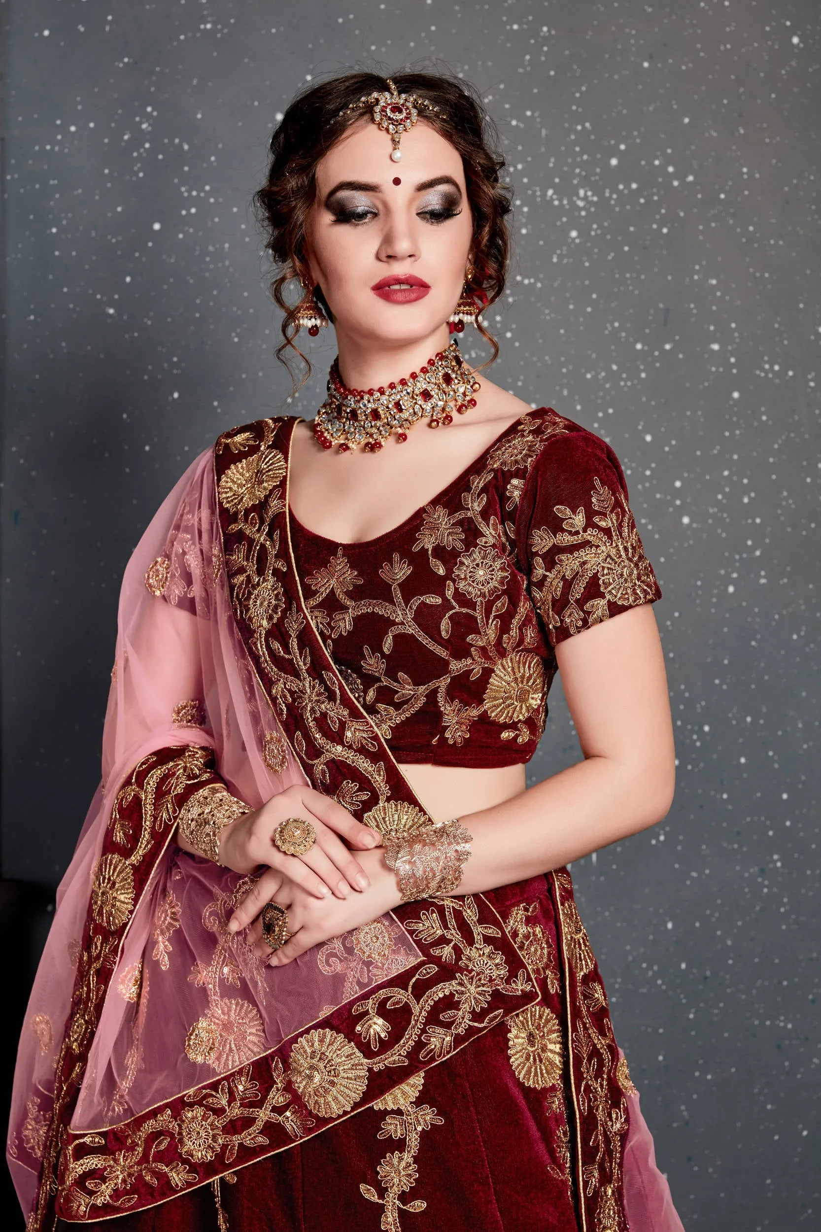 Innovative Maroon Bridal Wear Embroidered Velvet Lehenga Choli